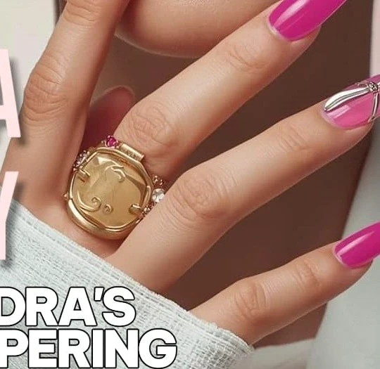 Elegant pink manicure with gold ring
